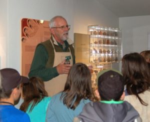 A docent speaking in front of a group