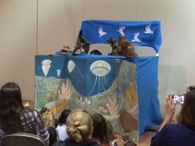 Dinosaur puppet show