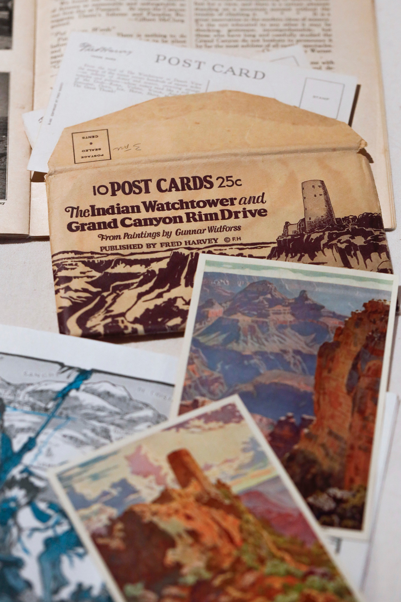 Fred Harvey Company postcards feature images of the Grand Canyon.